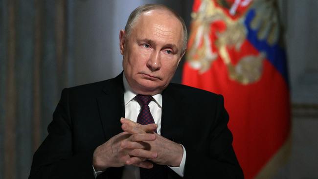 Russian President Vladimir Putin gives a TV interview on Wednesday. Picture: AFP