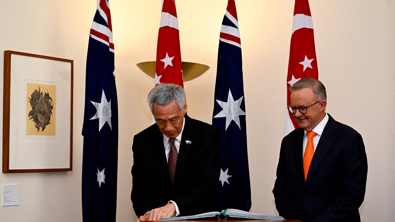 Singaporean Prime Minister Lee Hsieng Loong and Anthony Albanese announced the signing of the Green Economy Agreement in Canberra on Tuesday. Picture: Lukas Coch / Pool / AFP