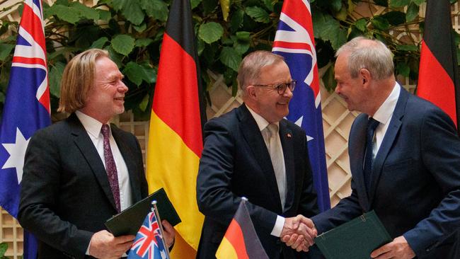 Australian Ambassador to Germany Philip Green, Prime Minister Anthony Albanese and Germany’s State Secretary, Federal Ministry of Defence Benedikt Zimmer after the signing of the deal. Picture:Twitter