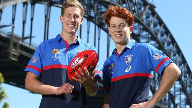 Ed Richards (right) with fellow Dogs rookie defender Aaron Naughton after last year’s draft in Sydney.