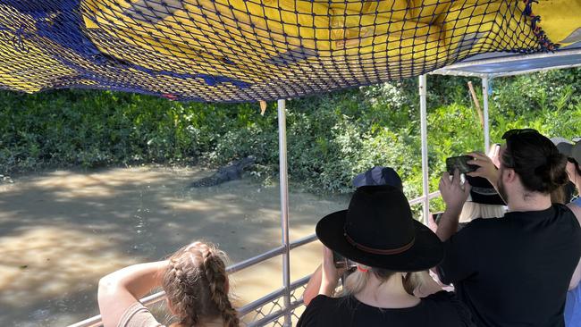 Crew and guests on an Adelaide River Cruises boat witnessed 6.2m croc Dominator eating another croc. Picture: Sean Dealy