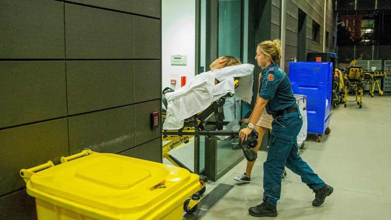 Ten public hospitals in southeast Queensland hit full capacity