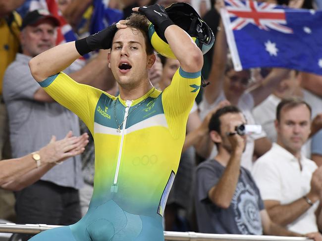 Sam Welsford of Australia reacts after winning the Men's 15km Scratch Race Final on day three of the track cycling competition at the XXI Commonwealth Games at the Anna Meares Velodrome in Brisbane, Australia, Saturday, April 7, 2018. (AAP Image/Dan Peled) NO ARCHIVING, EDITORIAL USE ONLY