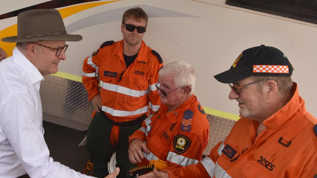 Prime Minister Anthony Albanese meets with State Emergency Service workers at a visit to the temporary waste disposal site at Lou Litster Park after Cyclone Kirrily. Picture: Evan Morgan