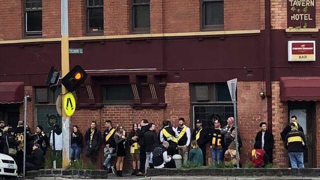 Tiger fans outside the London Tavern Hotel, Melbourne. Picture: Damon Johnston