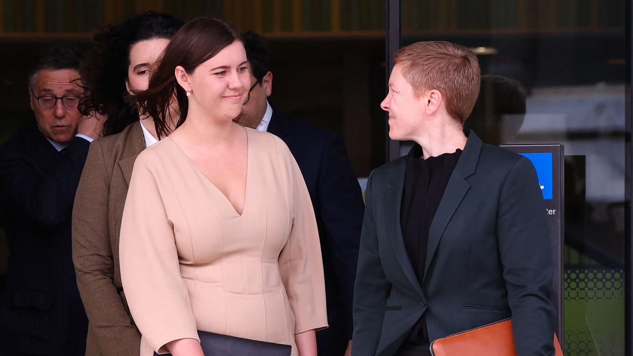 Brittany Higgins leaving the ACT Magistrates Court with members of her legal team. Picture: David Gray/ AFP.