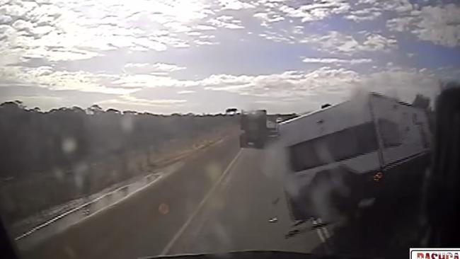 The caravan clipped the front of the road train, causing it to flip. Picture: Dashcam Owners Australia