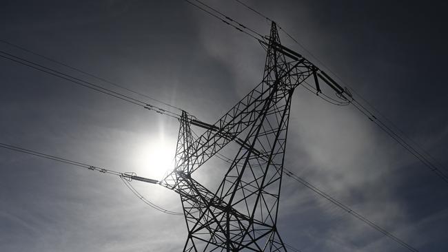 A power mast is seen near Tumut 3 power station at the Snowy Hydro Scheme in Talbingo, Tuesday, February 26, 2019. Scott Morrison announced today a further $1.3 billion investment into the Snowy Hydro 2.0 project. (AAP Image/Lukas Coch) NO ARCHIVING