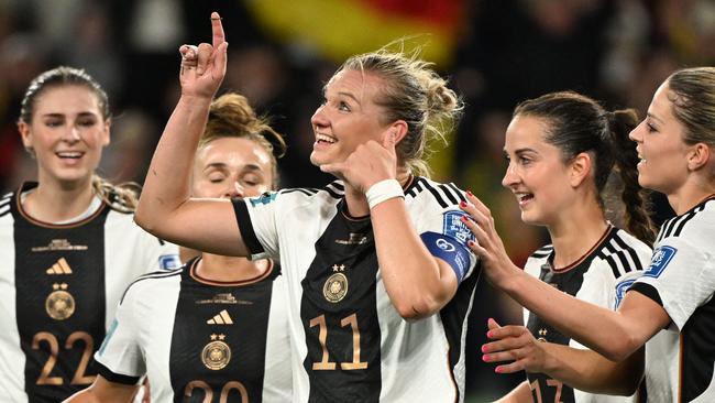 Alexandra Popp (C) celebrates with teammates after scoring a goal against Morocco. Picture: AFP.