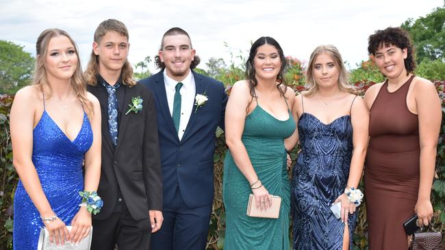 Group shot of students ready for the Mackay State High School 2021 Year 12 formal, November 16, 2021. Photo: Tara Miko and Janessa EkertEXCEPT THE GIRL ON THE END, SHE DID NOT GO TO THE FORMAL