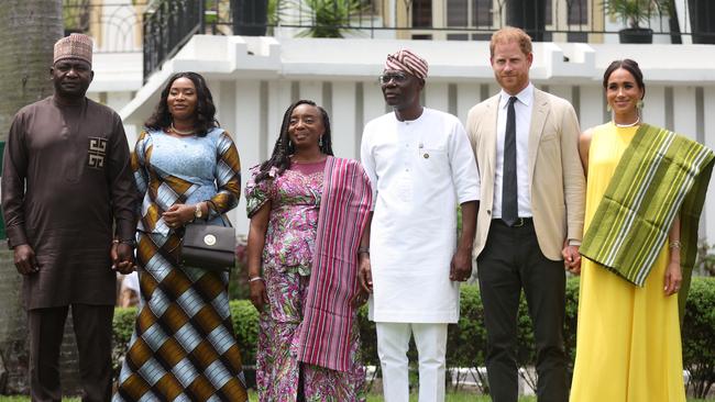 Nigeria Chief of Defense Staff Christopher Musa, his wife Lilian Musa, Lagos State Governor wife, Ibijoke Sanwo-Olu, Lagos State Governor, Babajide Sanwo-Olu, Britain's Prince Harry, Duke of Sussex, and Britain's Meghan Duchess of Sussex, pose for a photo at the State Governor House in Lagos. Picture: Kola Sulaimon/AFP