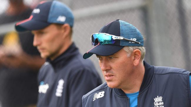 Former England coach Chris Silverwood and Joe Root. Picture: AFP