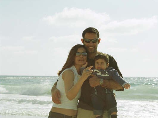 Suheir Zeidan with her husband Samer Gedeon and their son at a beach almost 15 years ago. Picture: Supplied