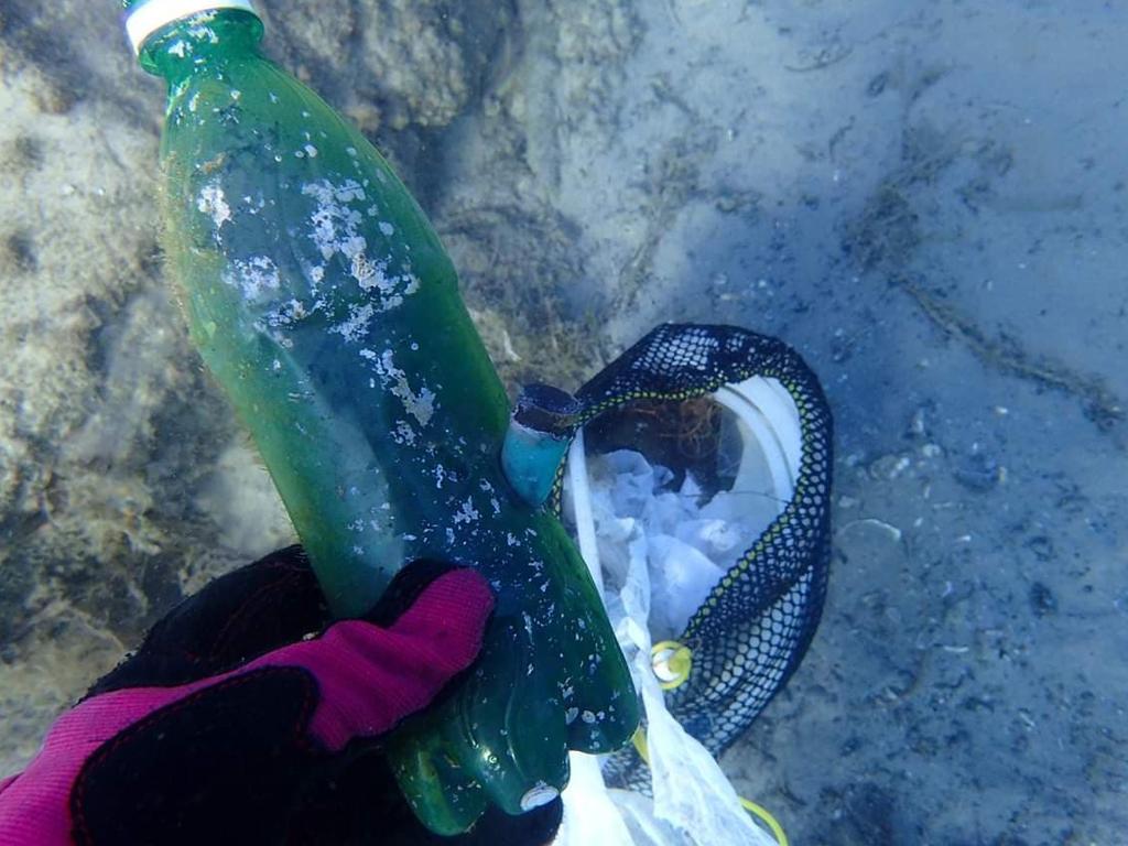 Environmental divers clean up the Gold Coast Seaway. This year they removed 1.75 tonnes from the waterways. Picture: supplied A bong.