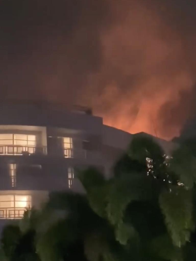 A video posted to social media shows a fireball above the Cairns hotel after a helicopter crashed into its roof.