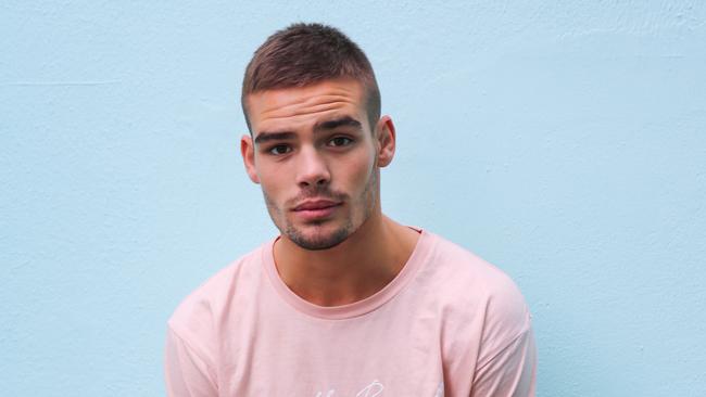 Eastern Suburbs model and rugby player Charlie Smith models for teammate Jack Grant, one of the men behind the North Bondi Motorino Social Club brand.