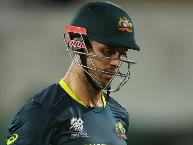 GROS ISLET, SAINT LUCIA - JUNE 15: Mitchell Marsh of Australia looks dejected while leaving the field after being caught out by Charlie Tear of Scotland (not pictured) during the ICC Men's T20 Cricket World Cup West Indies & USA 2024 match between Australia and Scotland at Daren Sammy National Cricket Stadium on June 15, 2024 in Gros Islet, Saint Lucia. (Photo by Robert Cianflone/Getty Images)