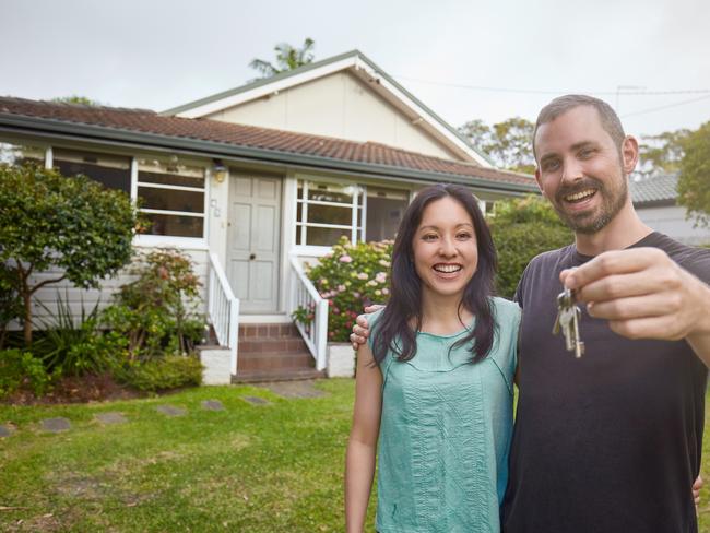 NEWS360 Commercial. Happy couple showing the keys of the new house. Picture: iStock