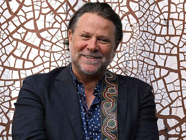 5/6/2024: John Collins, former Powderfinger bassist and Brisbane music venue owner, holding his guitar he calls Ã¢â¬ÅParisÃ¢â¬Â, who is among the recipients in the King's Birthday 2024 Honours list, at his venue ,Ã¢â¬ÅThe TriffidÃ¢â¬Â in Newstead, Brisbane. pic: Lyndon Mechielsen / The Australian