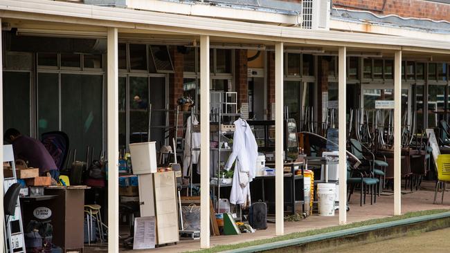 Community volunteers helped organise and clean up the damage caused by flood water from the Nepean River. Picture: Julian Andrews