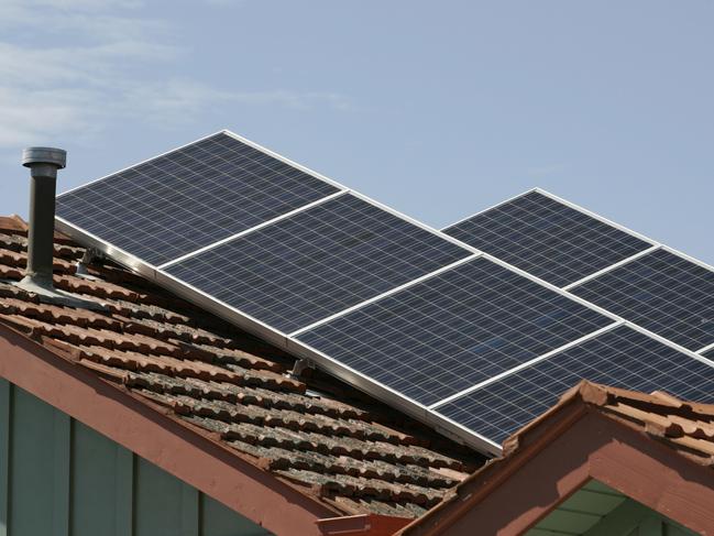 Solar panels on rooftops are seen in Melbourne, Monday, Jan. 5, 2009. (AAP Image/Raoul Wegat) NO ARCHIVING