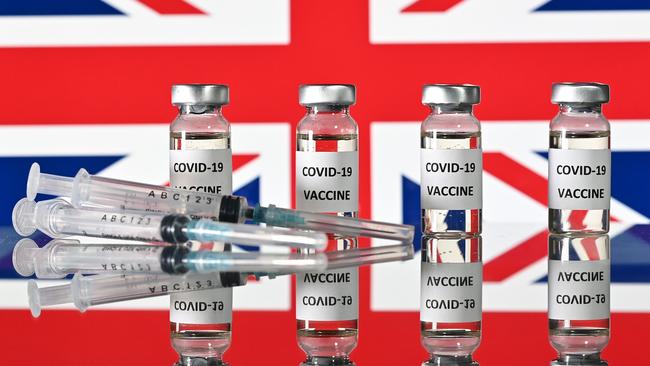 Vials with COVID-19 Vaccine stickers attached, and syringes, in the UK. Picture: Justin Tallis/AFP