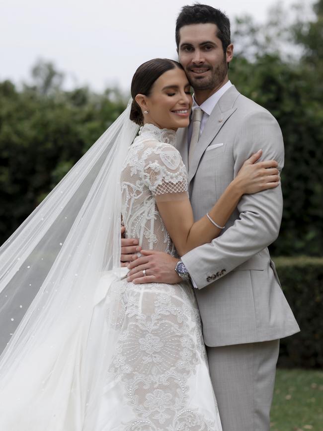 Erin Holland and Ben Cutting at their wedding. Picture: Bayleigh Vedelago