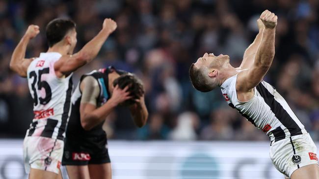 Taylor Adams and Nick Daicos react on the final siren. Picture: Sarah Reed/AFL Photos