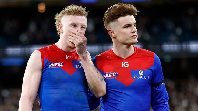 MELBOURNE, AUSTRALIA – SEPTEMBER 07: Clayton Oliver (left) and Bayley Fritsch of the Demons look dejected after a loss during the 2023 AFL First Qualifying Final match between the Collingwood Magpies and the Melbourne Demons at Melbourne Cricket Ground on September 07, 2023 in Melbourne, Australia. (Photo by Michael Willson/AFL Photos via Getty Images)