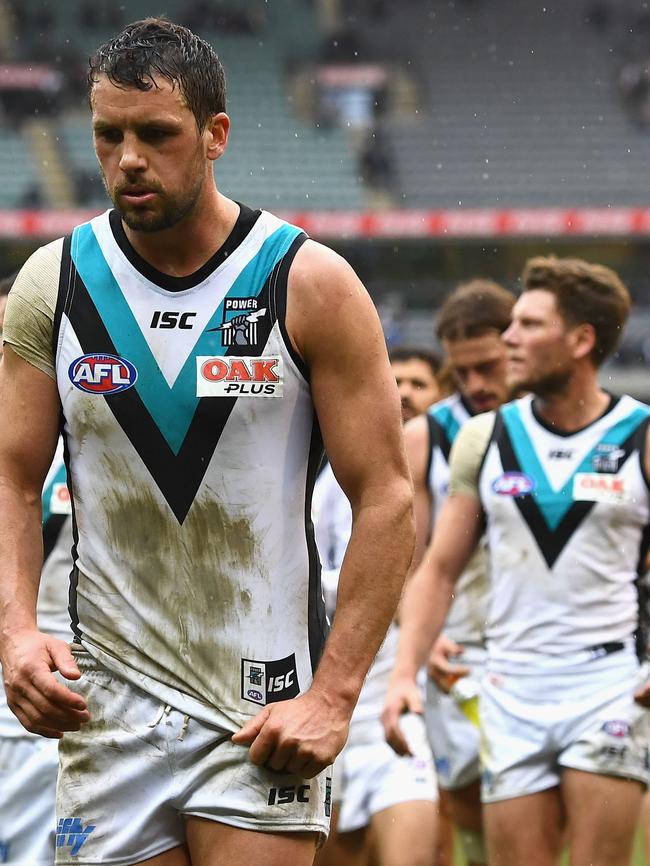 Travis Boak leads the Power off the MCG after their Round 22 loss to Collingwood. Picture: Quinn Rooney/Getty Images)