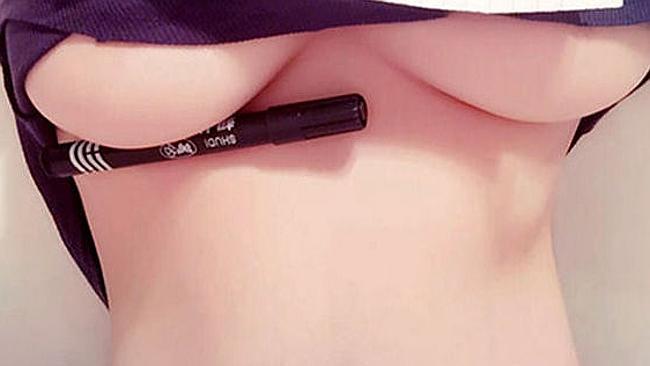 Women are posting boob-holding pen pics 