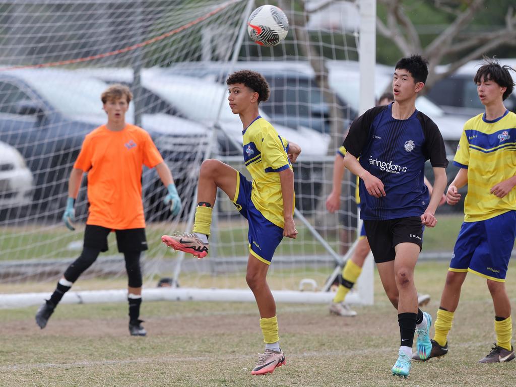 Premier Invitational Football 2024 tournament at Glennon Park Nerang. Field 1...Selwyn Utd (blue) V Brisbane Strikers (Yellow). Picture Glenn Hampson