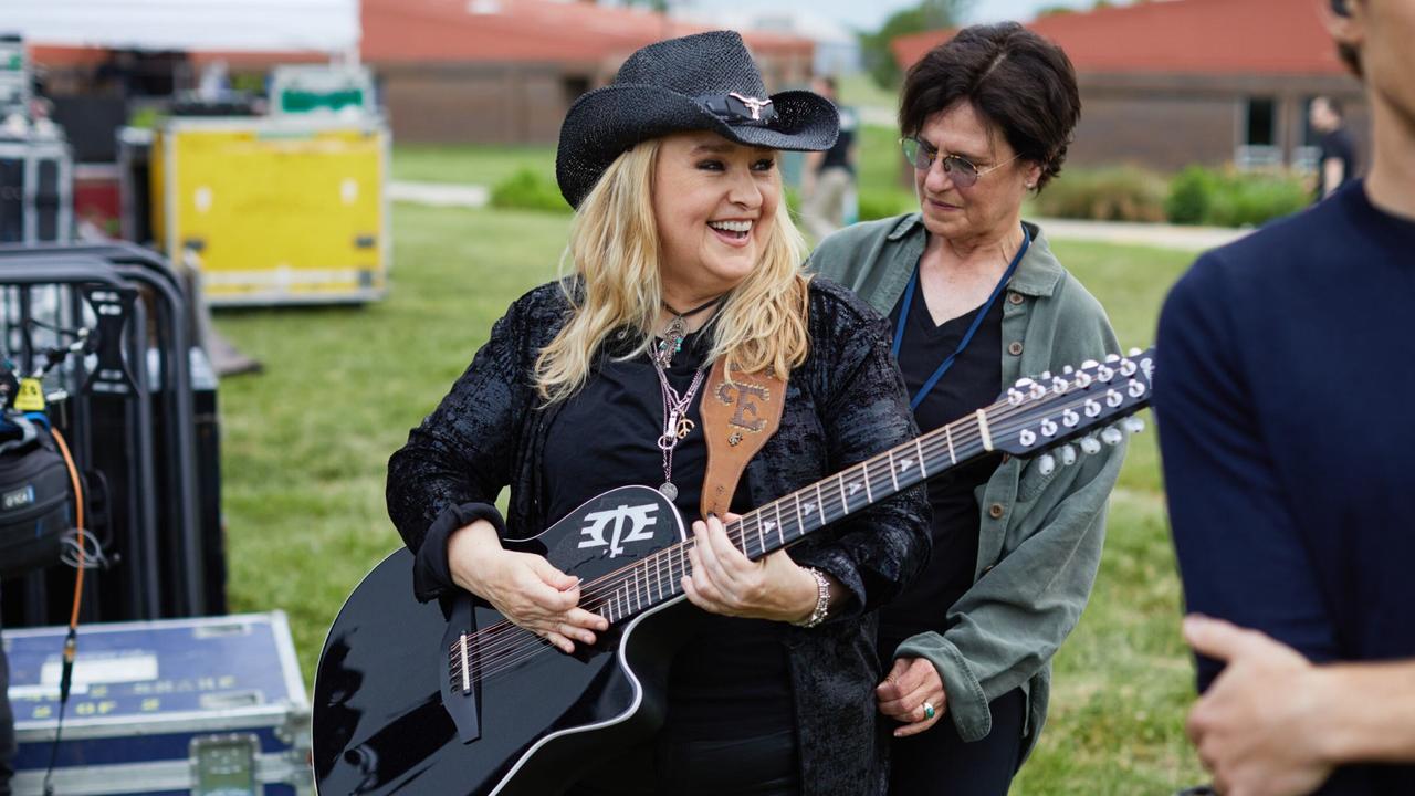 Melissa Etheridge with her wife Linda. Shortly before taking to the stage, Etheridge was overcome with emotion.