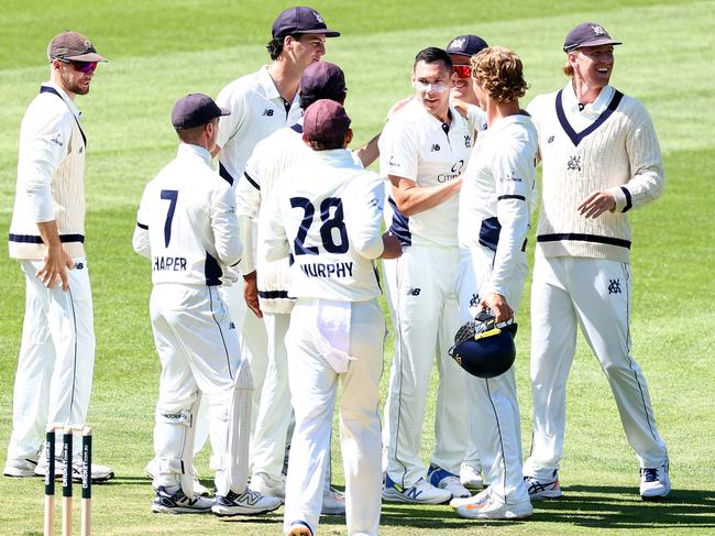 Scott Boland is congratulated by teammates after taking the wicket of Sam Konstas. Picture: Getty