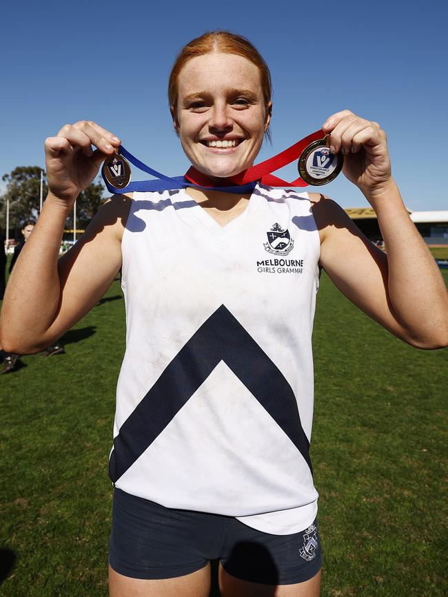 MELBOURNE, AUSTRALIA - AUGUST 09: Sophie McKay of Melbourne Grammar poses for a photograph after being named best on ground. (Photo by Daniel Pockett/AFL Photos/via Getty Images)