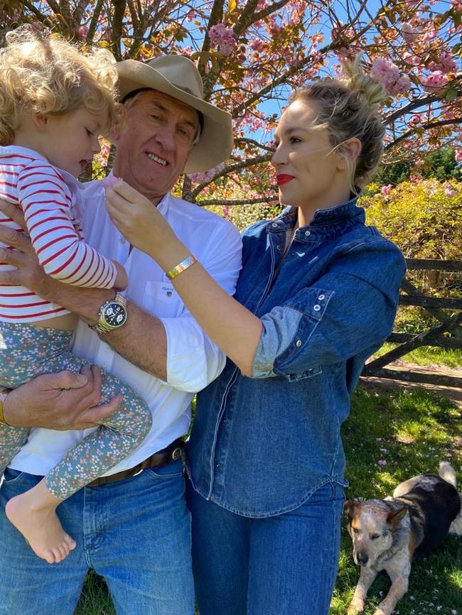 Phoebe Burgess with her father, Mitch Hooke, and daughter Poppy. Picture: Instagram