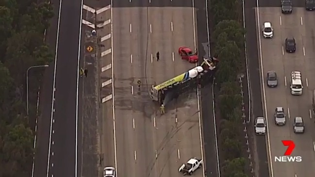 M1 on Gold Coast closed after fuel truck rollover at Helensvale 7 News