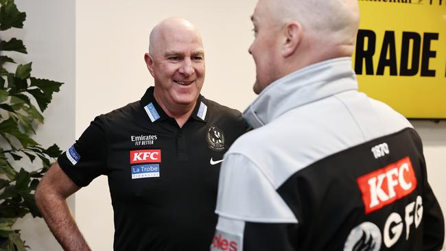 MELBOURNE, AUSTRALIA - OCTOBER 03: Graham Wright, GM of Football of the Magpies speaks with Chris Davies, GM of Football of the Power during The 2023 AFL Trade Period at Marvel Stadium on October 09 , 2022 in Melbourne, Australia.