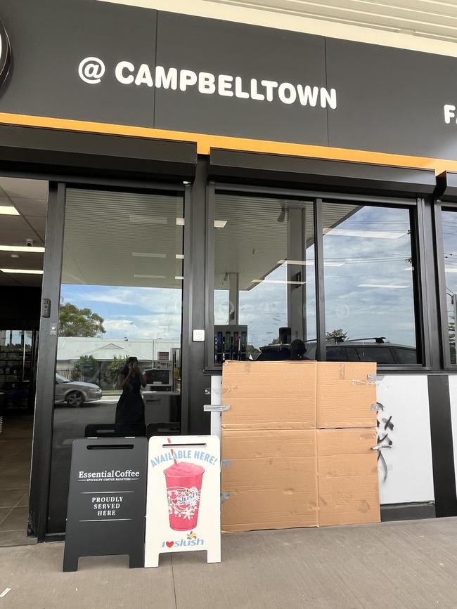 Graffiti was covered with cupboard as the petrol station resumed business.