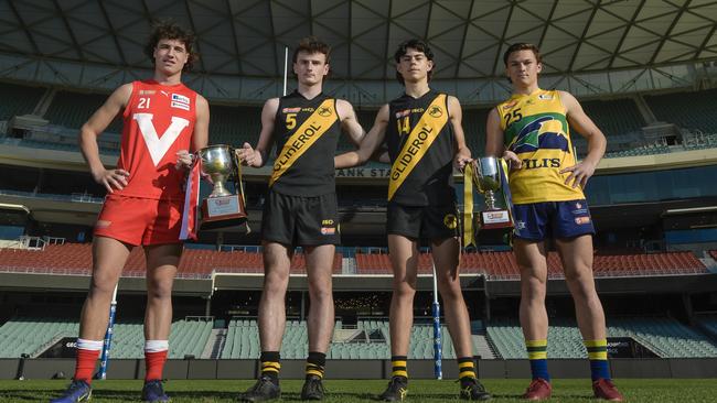 Captains James White (North Adelaide U18s) Ben Ridgway (Glenelg U18s), Archer Rouvray (Glenelg U16s) and Jett Hasting (Eagles U16s) ahead of the SANFL under-18 and under-16 grand finals at Adelaide Oval. Picture: Roy Vandervegt