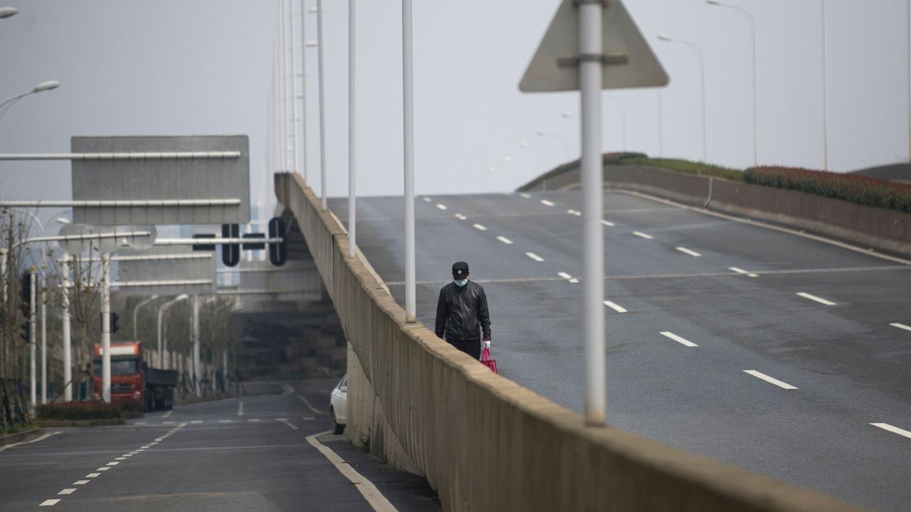 Wuhan’s 11 million residents went into lockdown from January 23. (Photo by STR / AFP) / China OUT