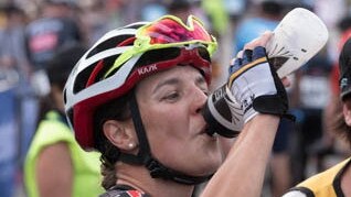 Rebecca Wiasak rehydrates after winning the 2019 Australian women’s national criterium title.