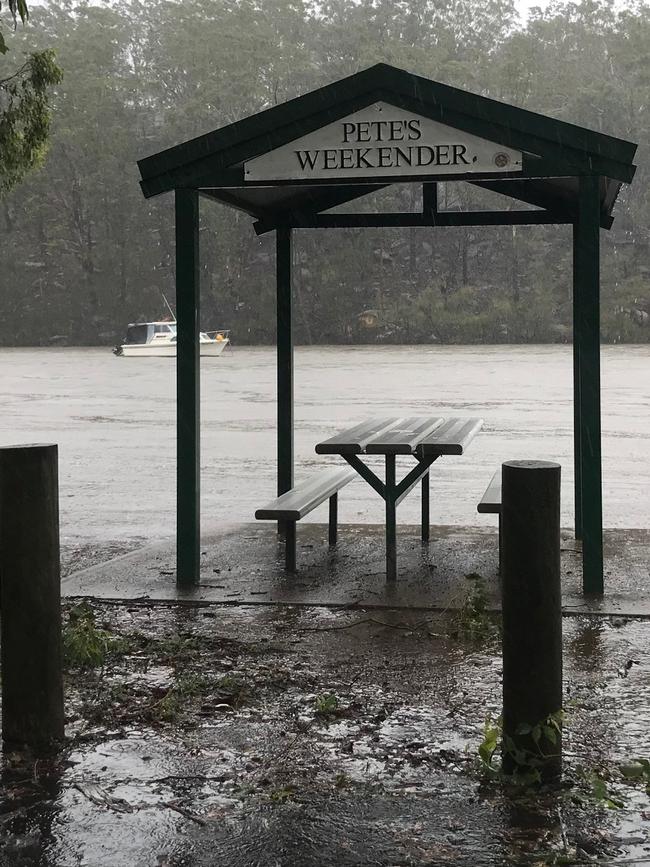 Flooding at Carinya Rd, Picnic Point, on Sunday. Picture: Steve Tuntevski