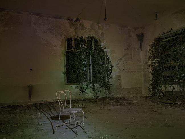 Chilling ... rooms in the mental asylum at night on Poveglia Island. Picture: Ella Pellegrini