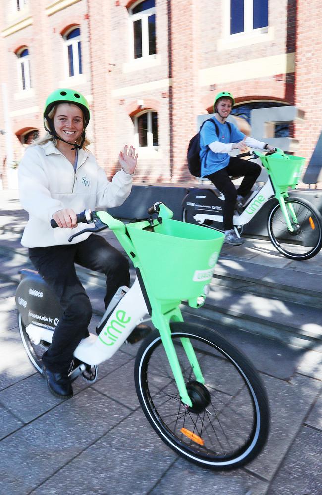 University students Lucy Naylor and Will Rothe try out the new e-bikes. Picture: Alan Barber