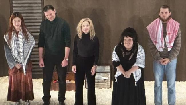 Harry Greenwood, right along with co-stars Megan Wilding, second right, and Mabel Li, left, wore keffiyeh scarfs during the encore at the opening night of the STC production of The Seagull at Sydney’s Roslyn Packer Theatre. Picture: Instagram