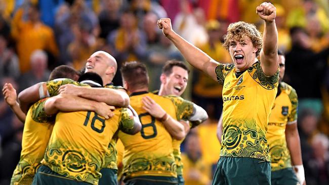 Ned Hanigan, Stephen Moore and team mates celebrate victory.