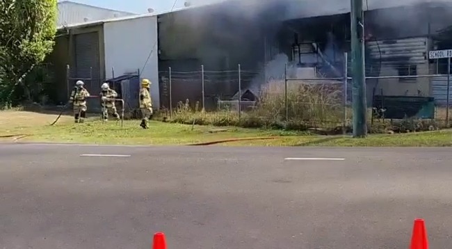 Crews douse hotspots in major Yandina business blaze