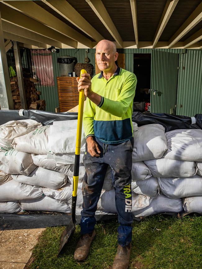 Max Bell with sandbags at his holiday shack in Mannum. Picture: Tom Huntley