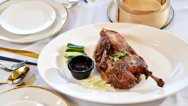 The restaurant’s signature dish, the crispy duck.